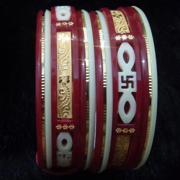 Gold swastik design plastic bangle by 